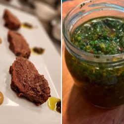 A close up of a plate of food next to a jar of sauce.