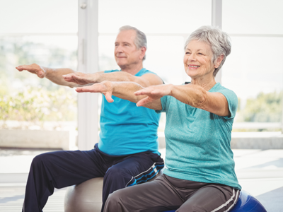 Elderly couple working out