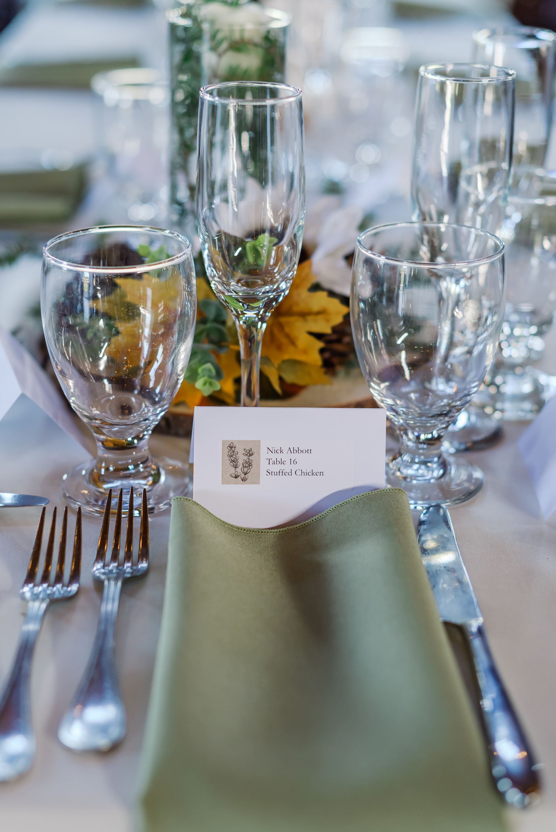 A man and a woman are standing at a bar.