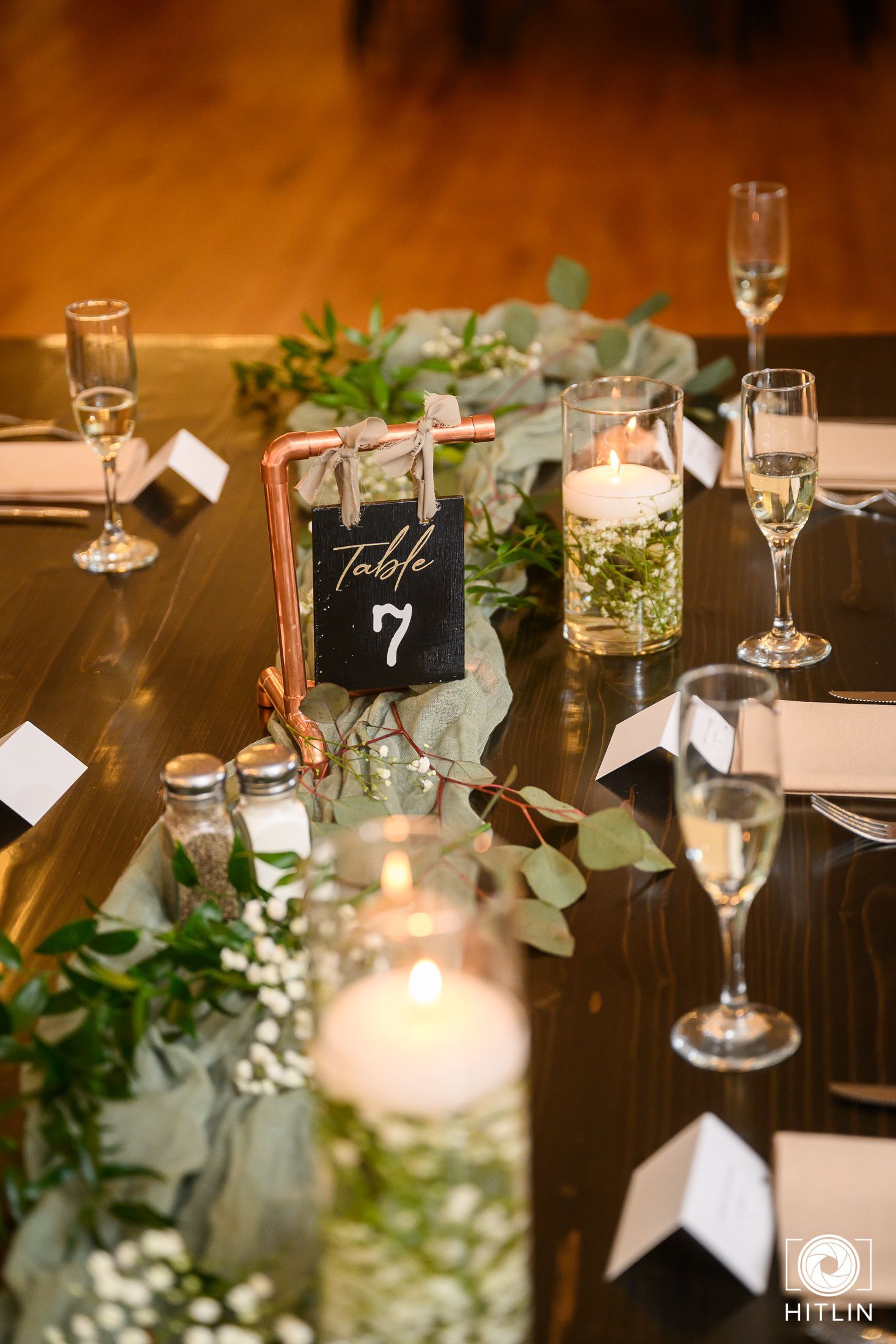 An event hall with a number of tables set up