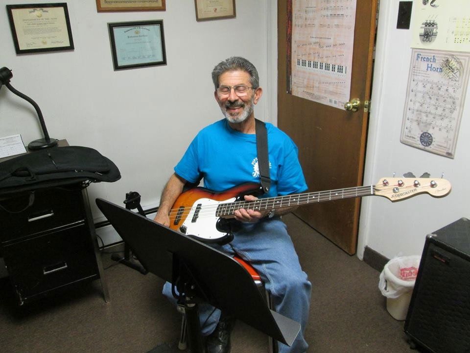 playing electric guitar