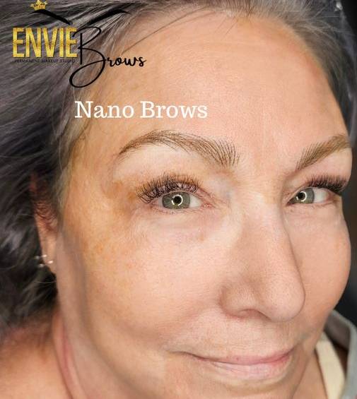 Woman with light brown Nano Brows, looking at the camera.