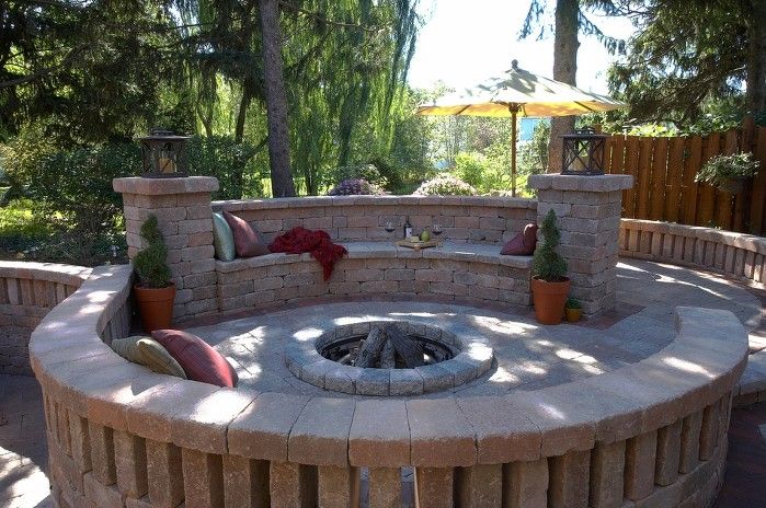 Stonehenge patio with fire pit and seat wall