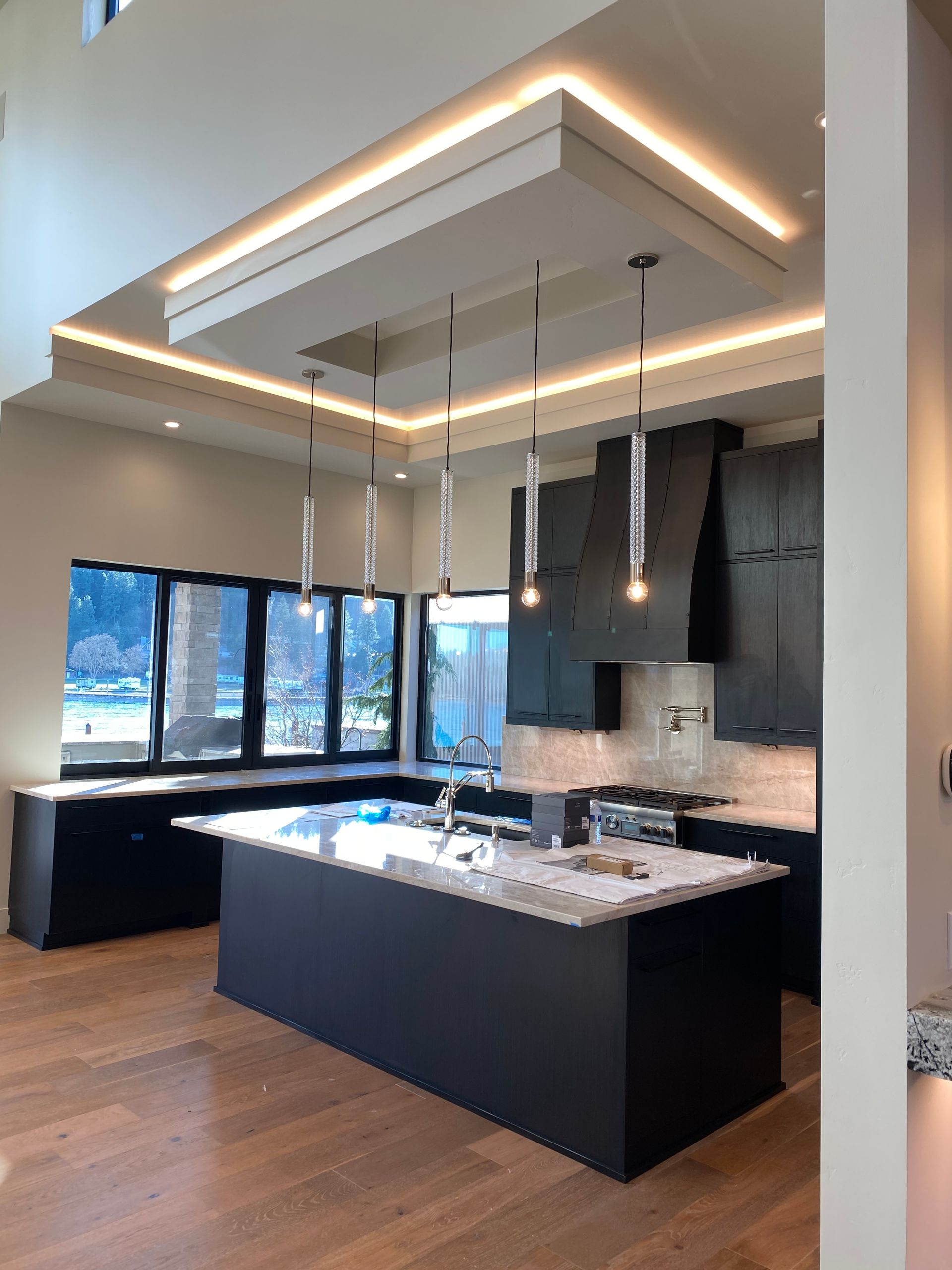 There is a large island in the middle of the kitchen.