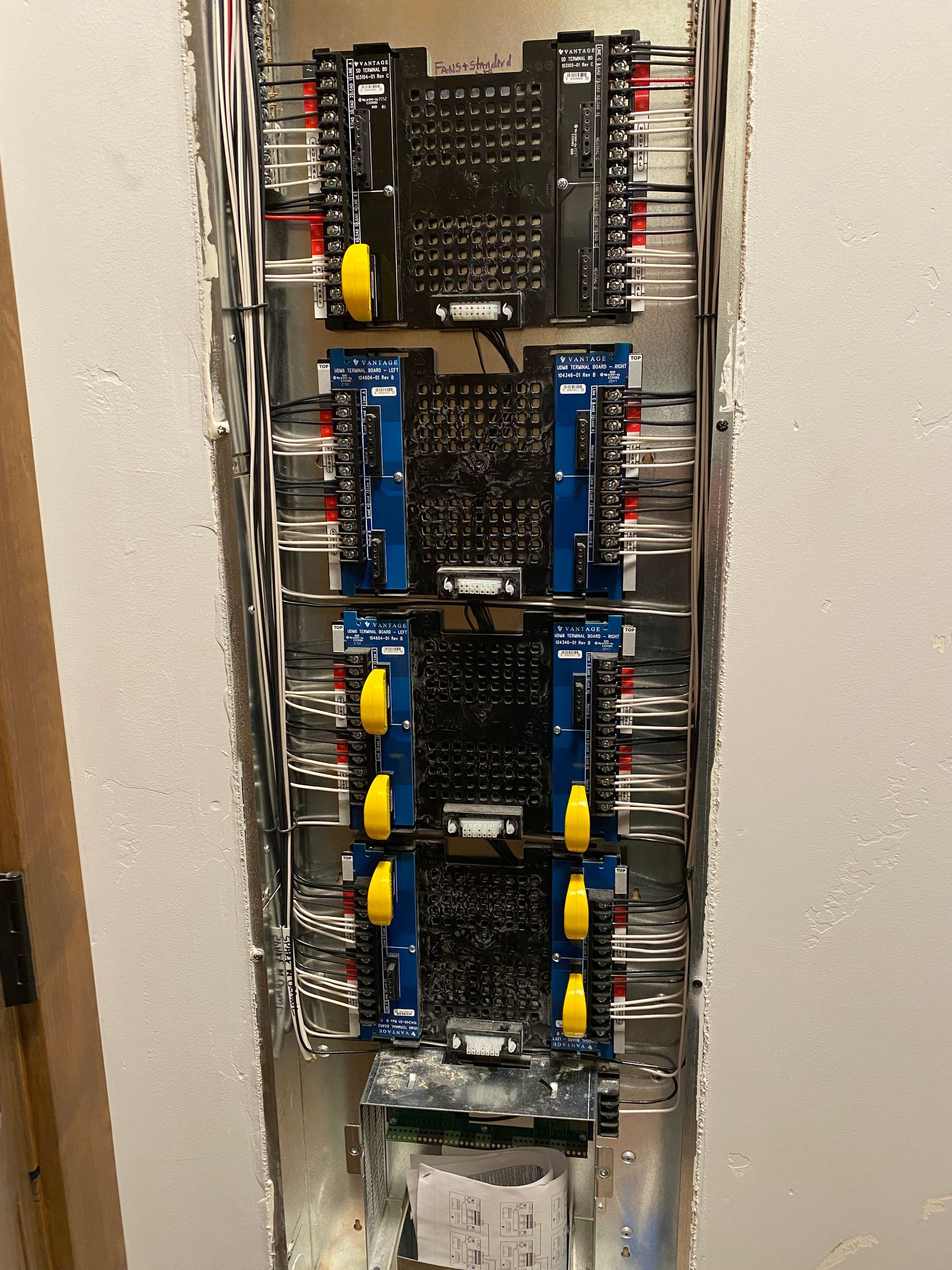 A close up of a electrical panel on a wall.