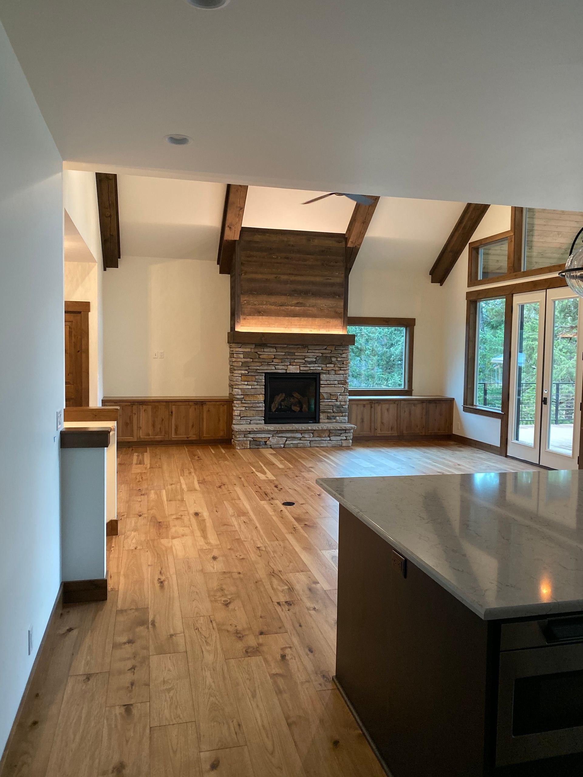 There is a fireplace in the middle of the room.