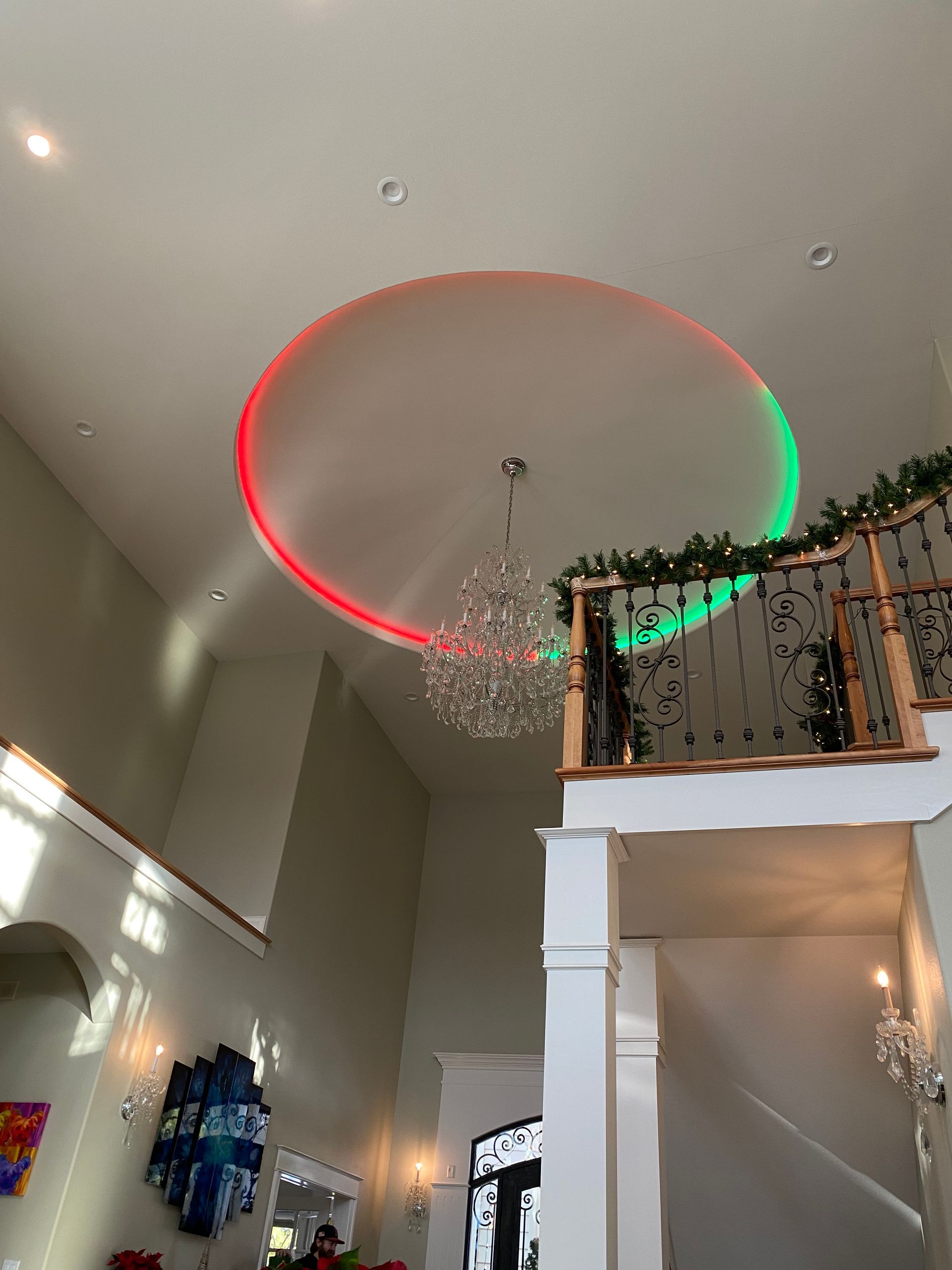 A large room with a chandelier hanging from the ceiling.