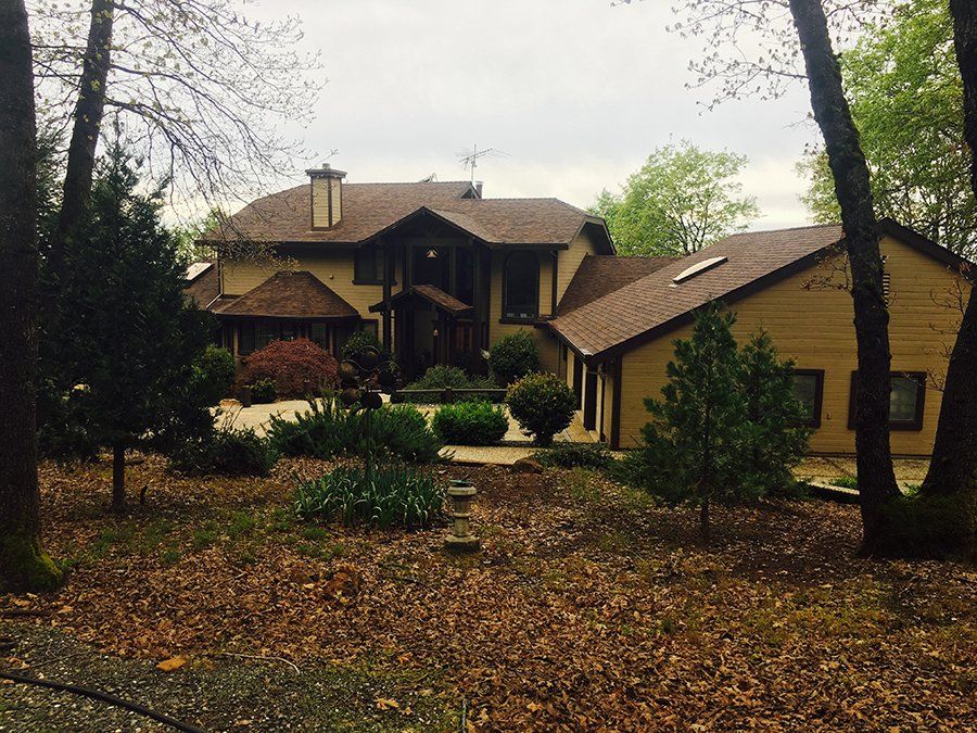 Residential structure with brown roofing