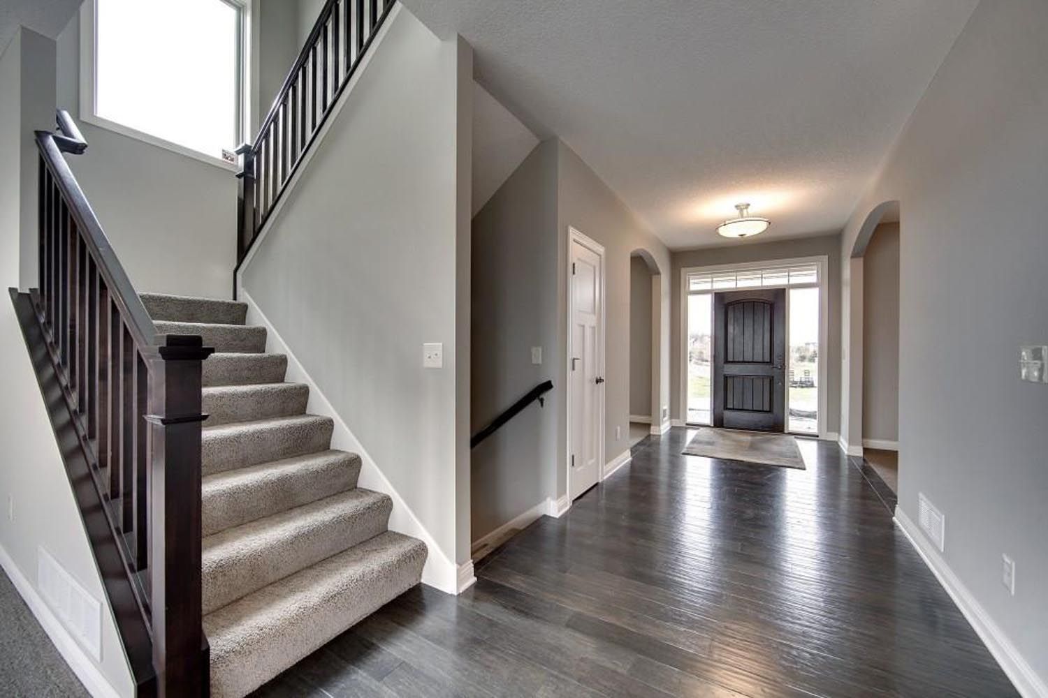a staircase leading up to the second floor of a house