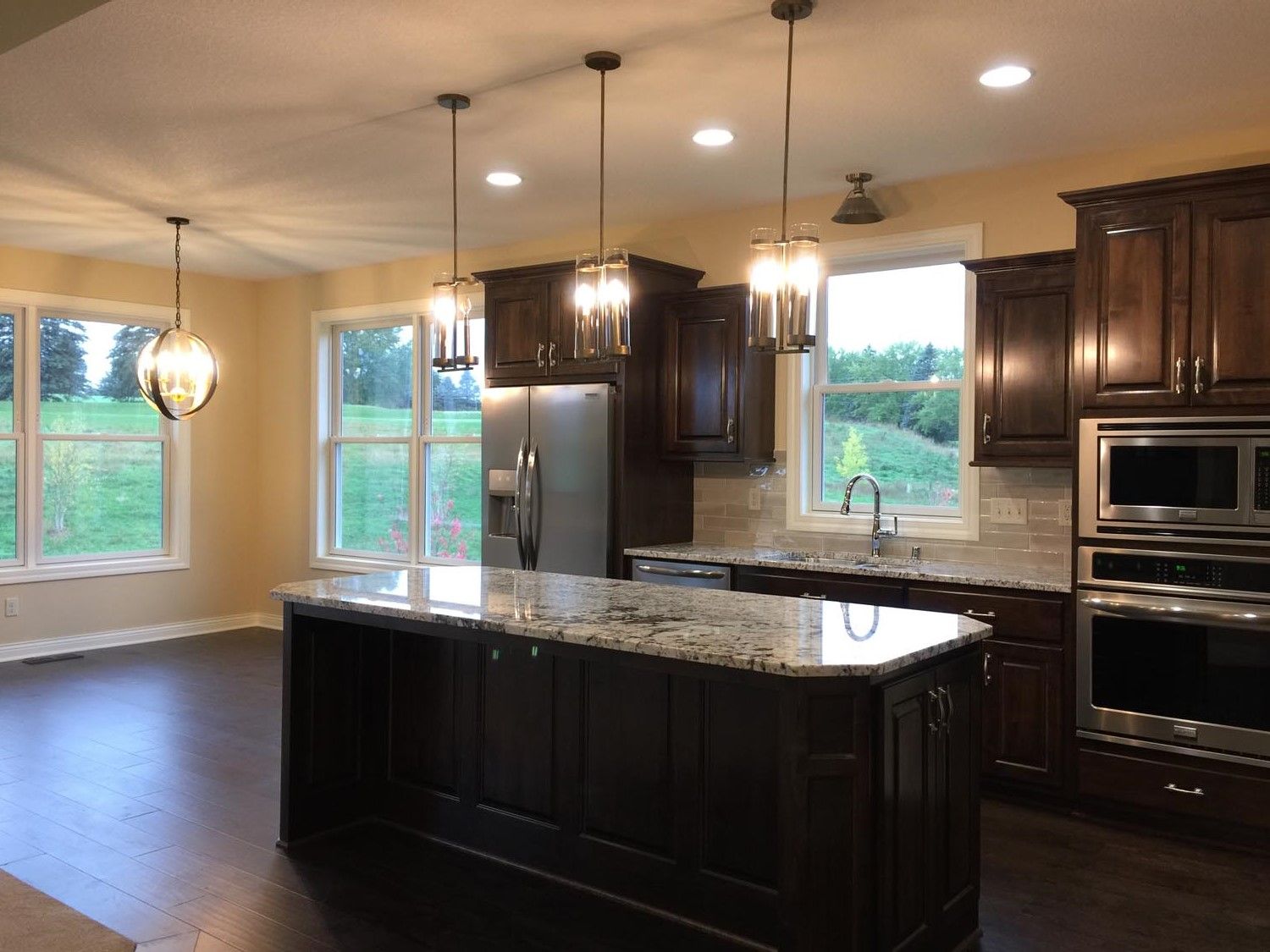 there is a large island in the middle of the kitchen