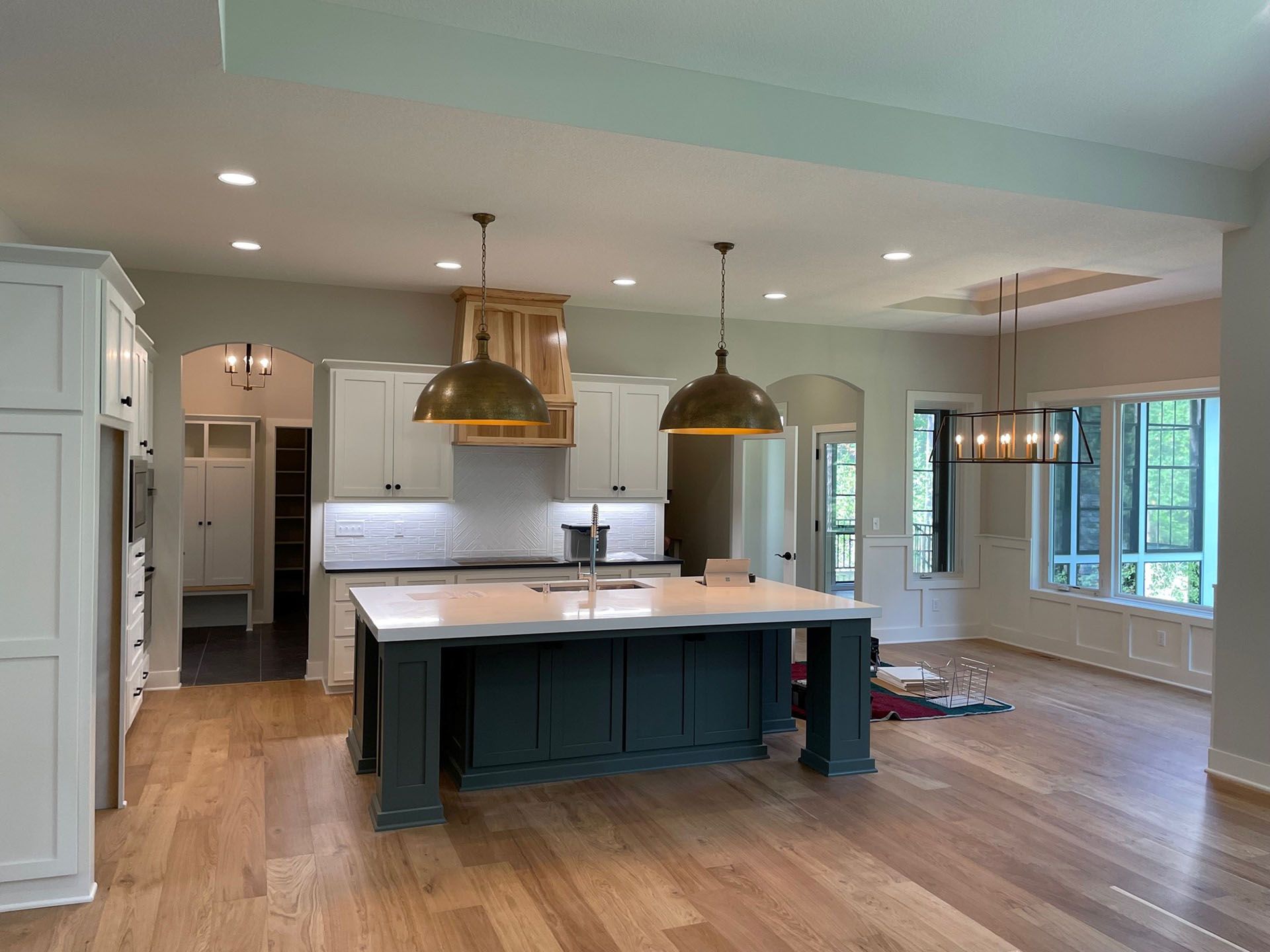 there is a large island in the middle of the kitchen