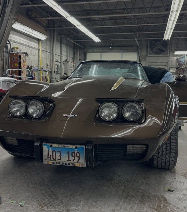 Brown convertible Corvette