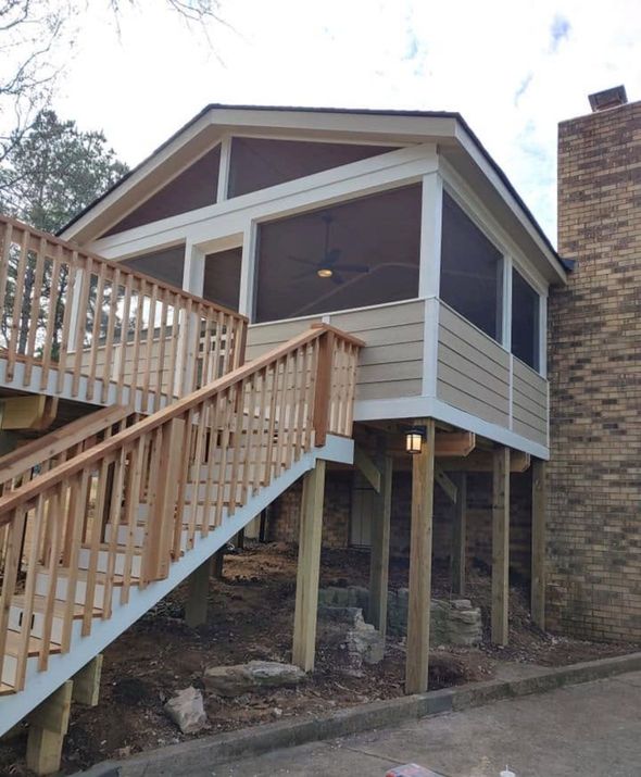 House with a screened-in porch and a new deck and stairs