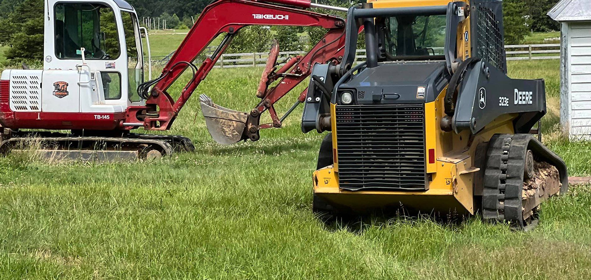 Excavating machines being used for sewer repair service