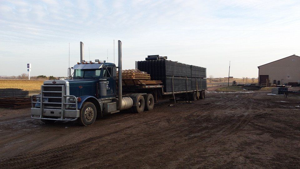 Truck carrying tubes and calving pen