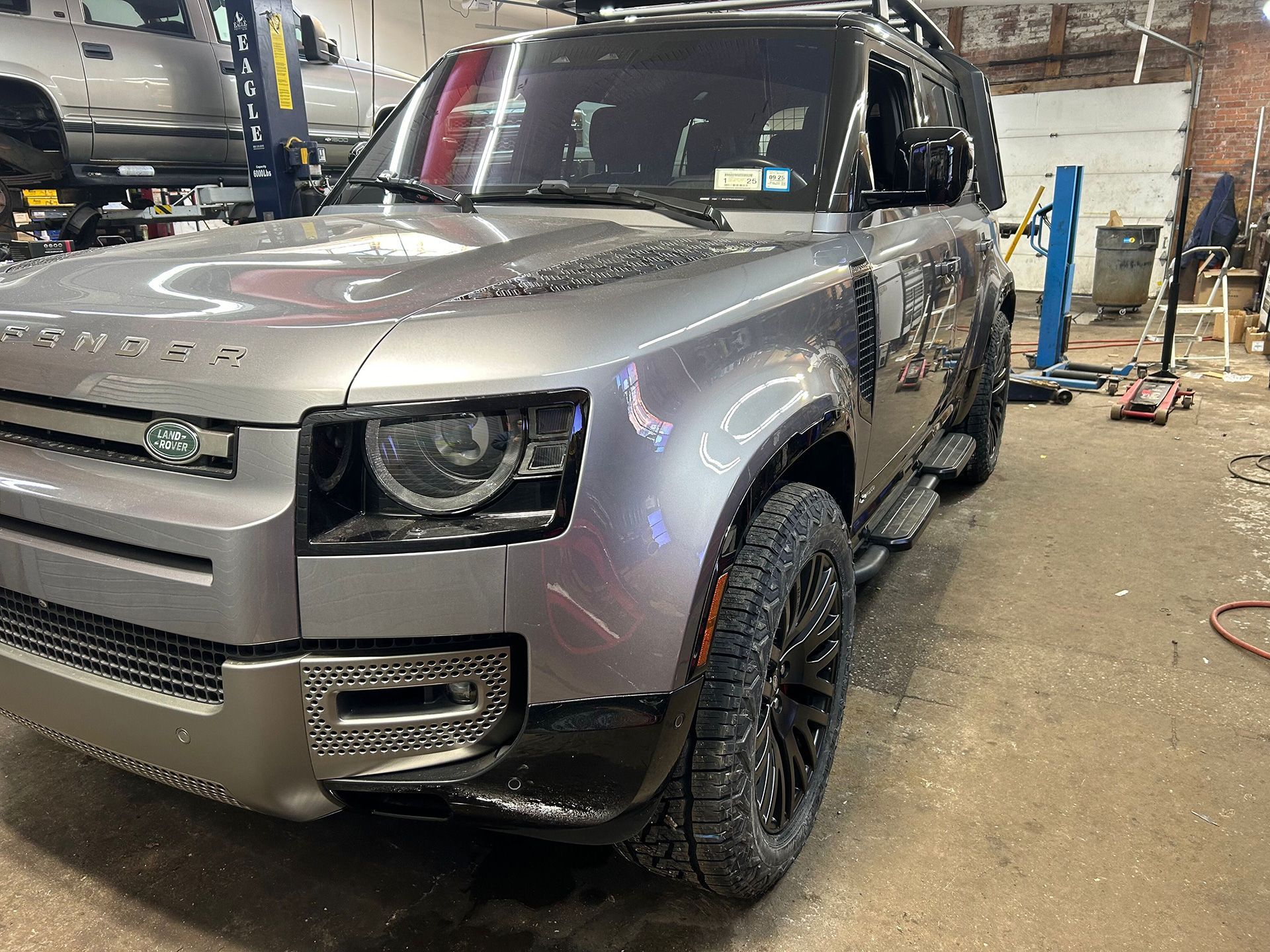 A gray Land Rover Defender