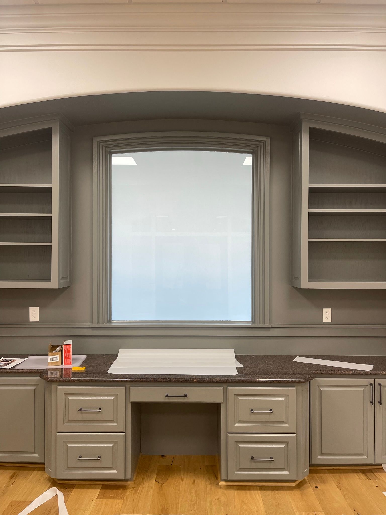 There is a large window in the middle of the room.