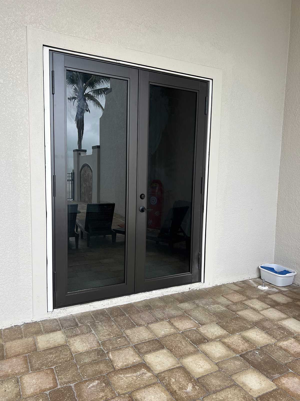 A pair of sliding glass doors leading to a patio.