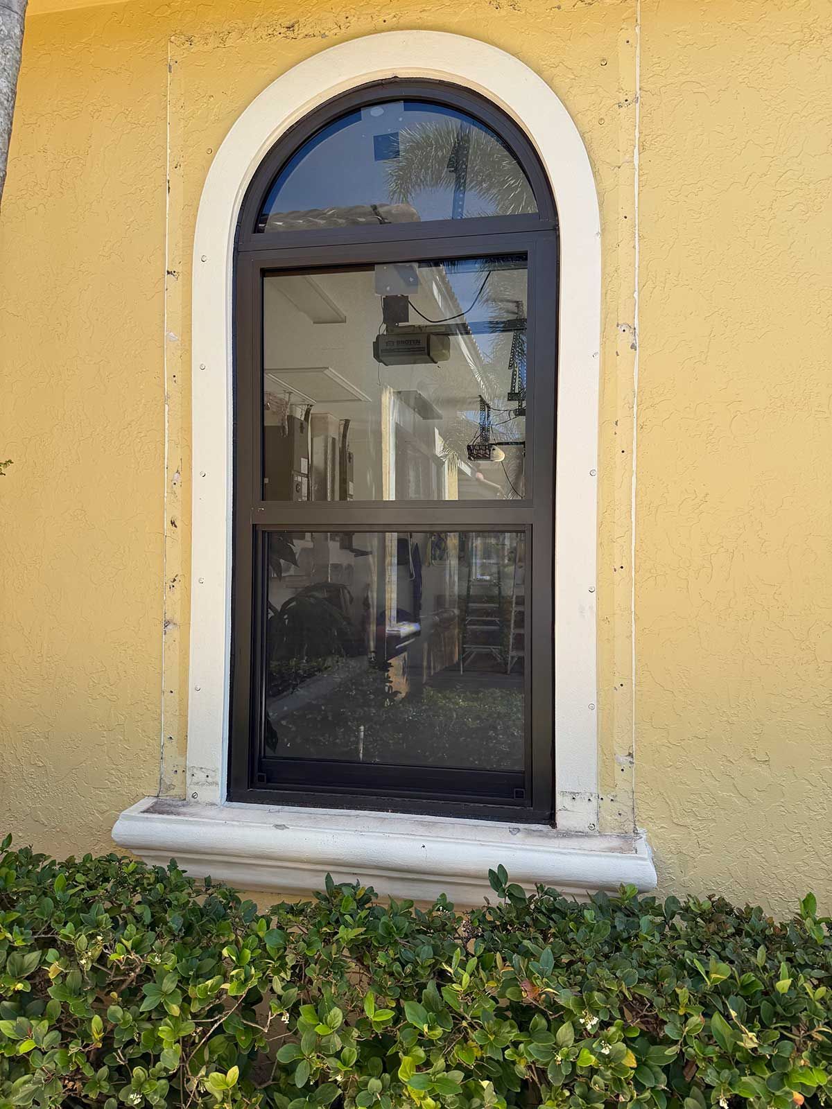 There is a large window on the side of a building.