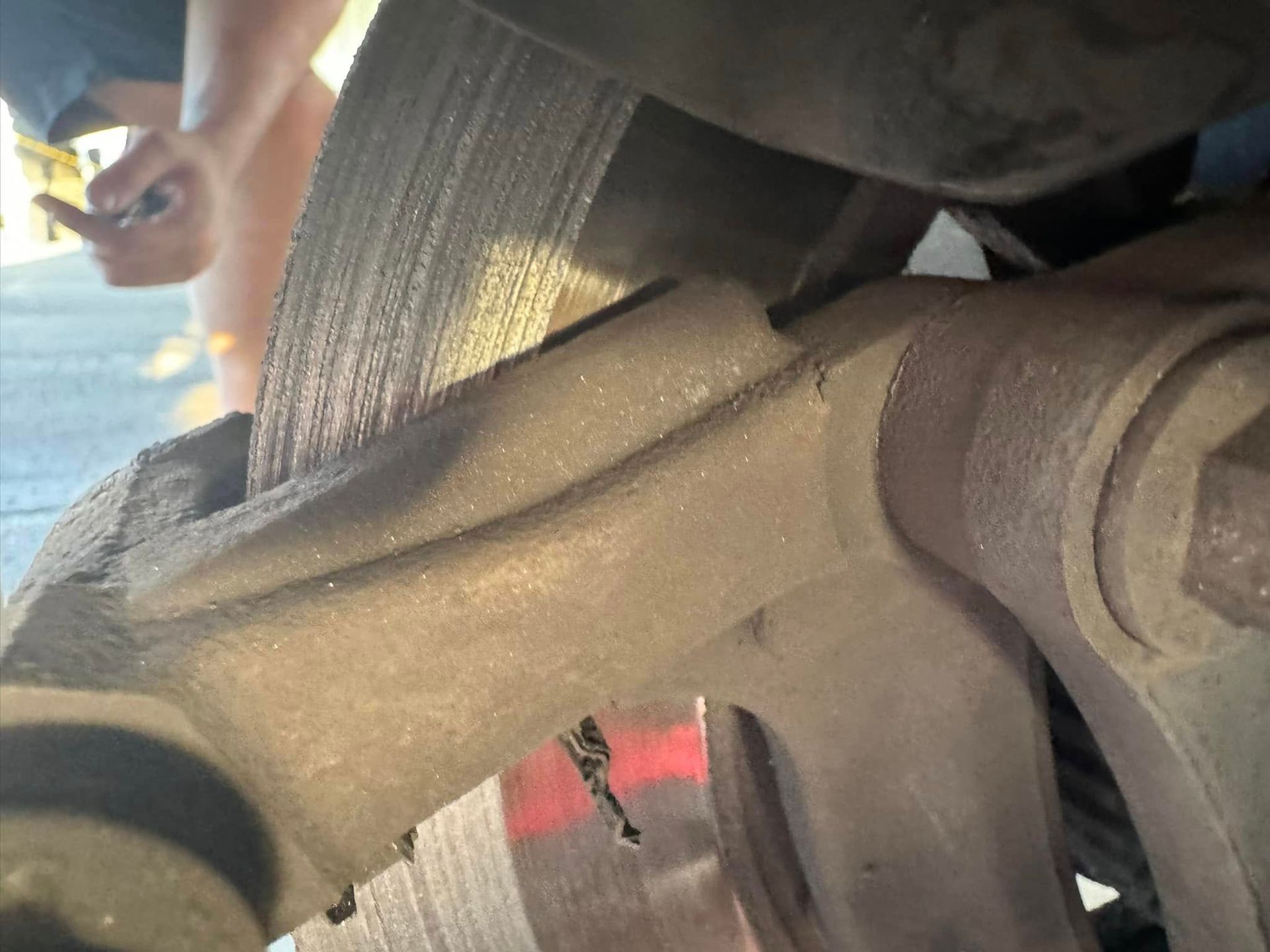 A close up of a brake caliper on a car