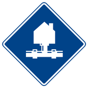 A blue sign with a house and pipes on it