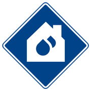 A blue diamond shaped sign with a house and a drop of water on it