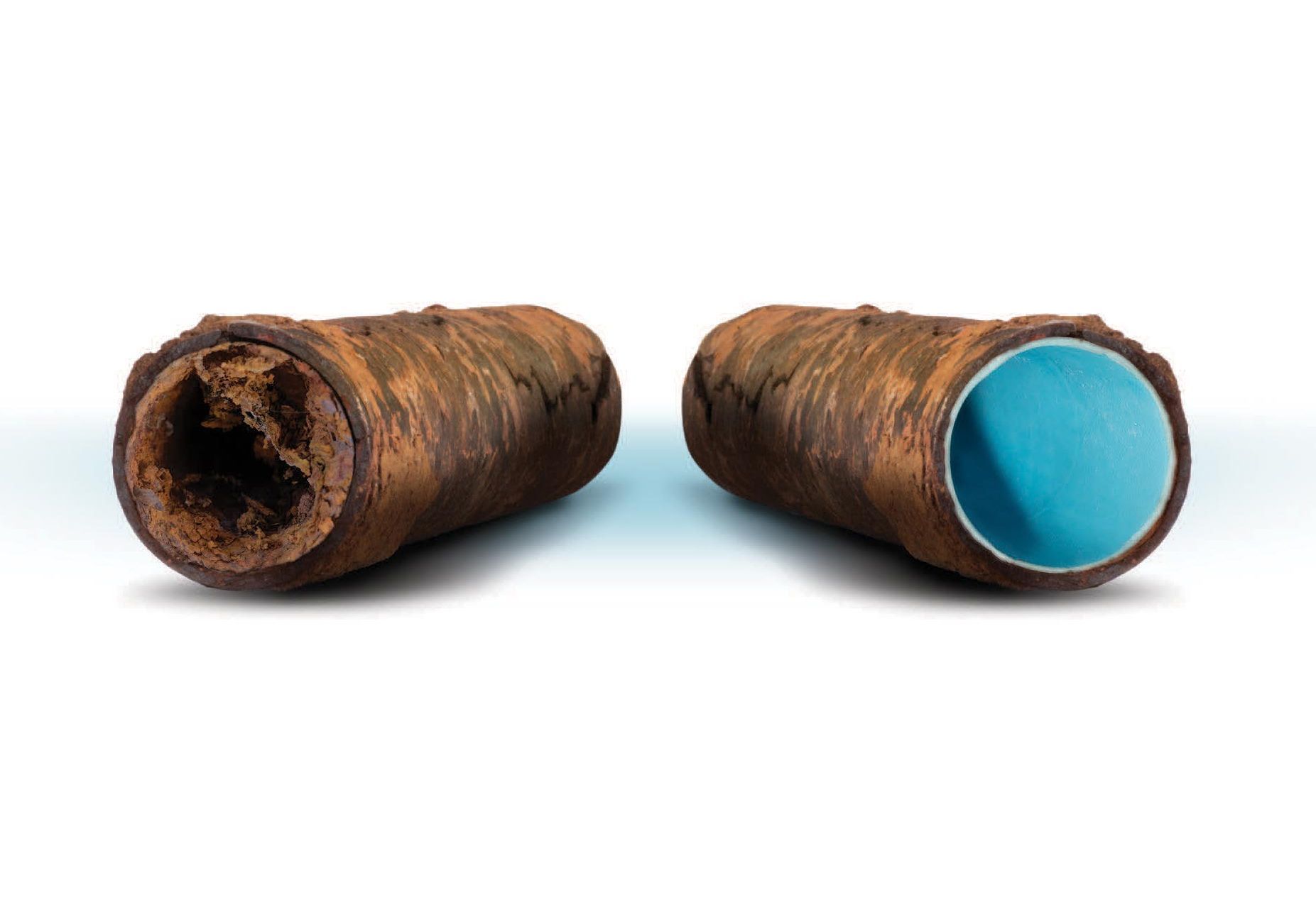 A close up of a rusty pipe next to a new pipe.