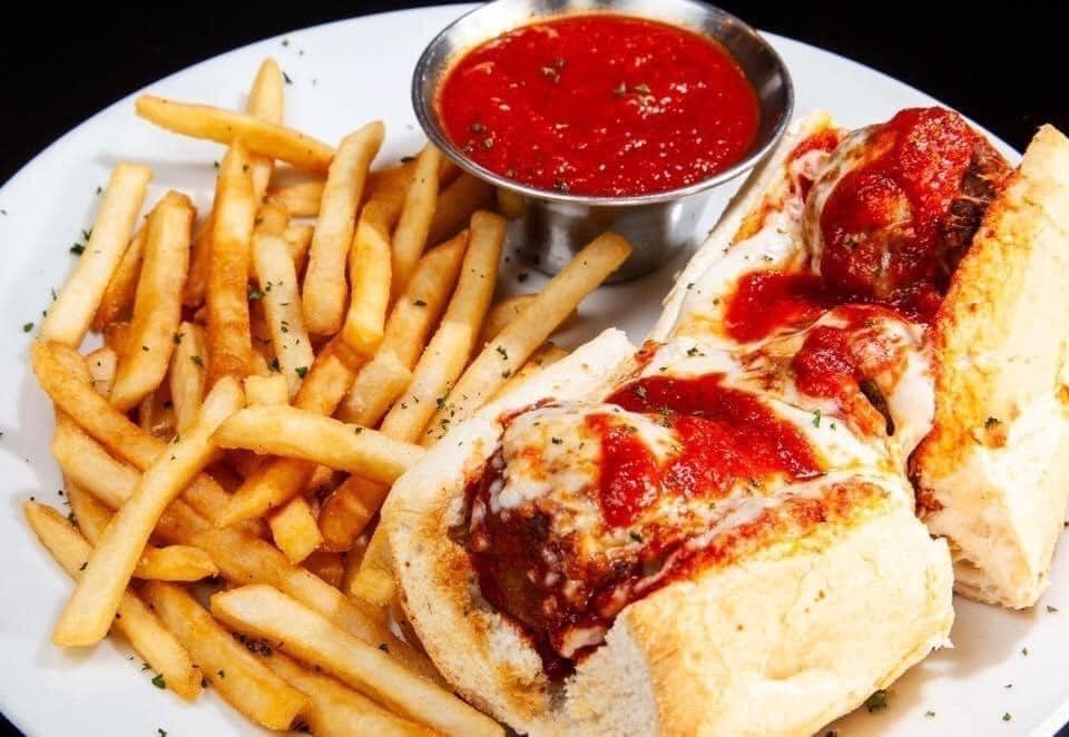 Meatball sandwich and fries
