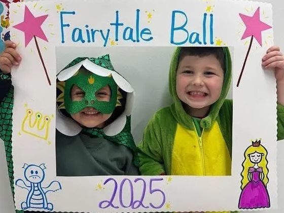 Two kids in costumes at a