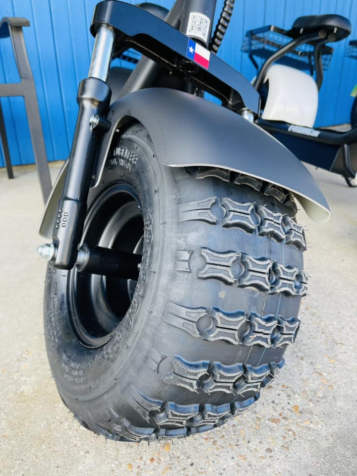 A close up of a tire on a scooter