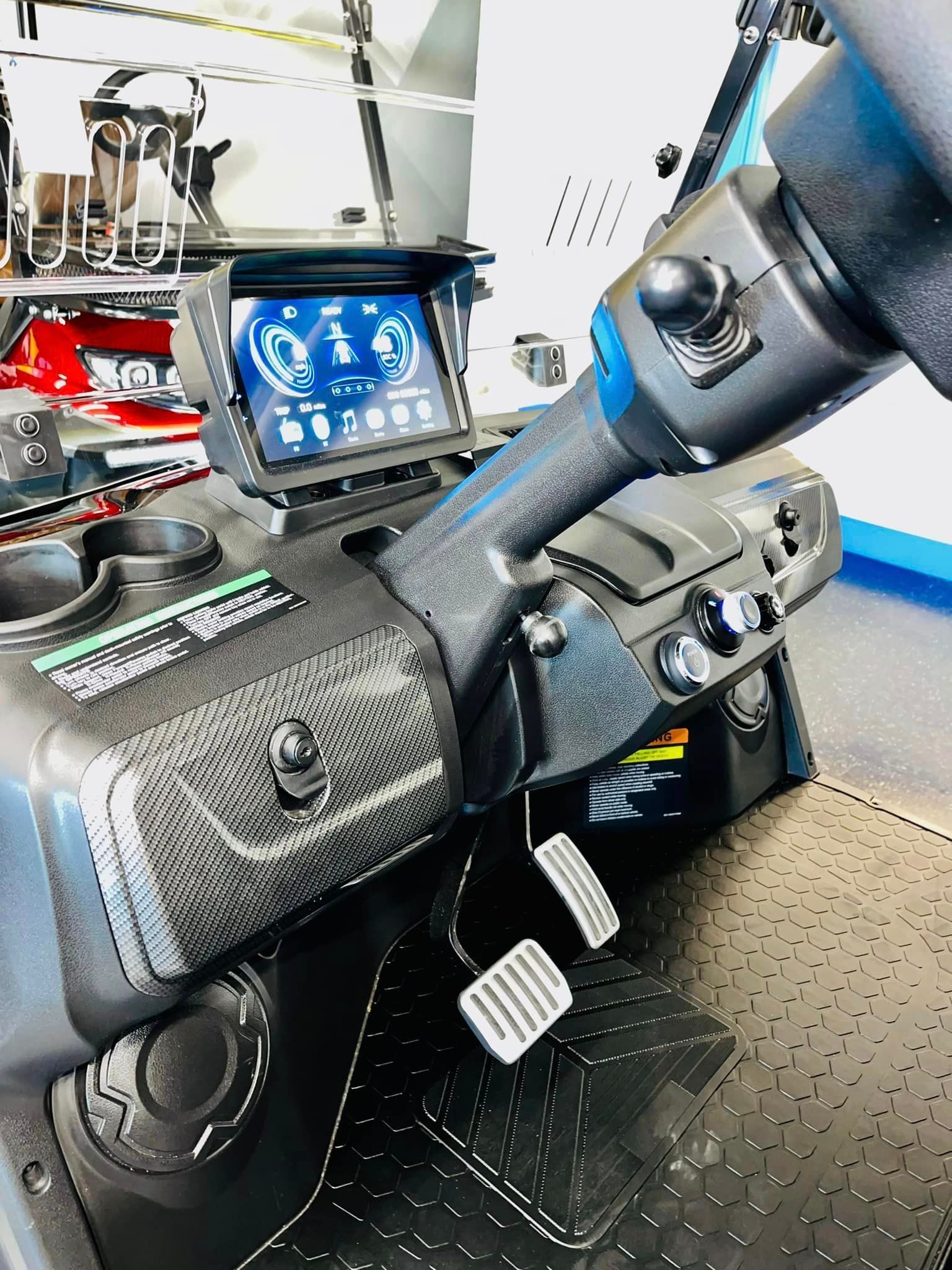 A close up of the dashboard of a golf cart