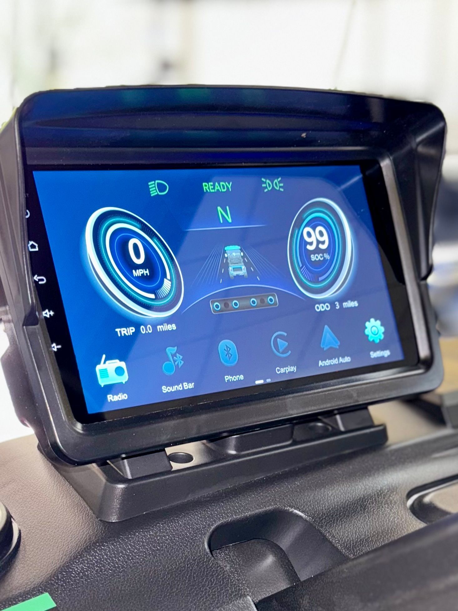 A car radio with a visor on top of it.