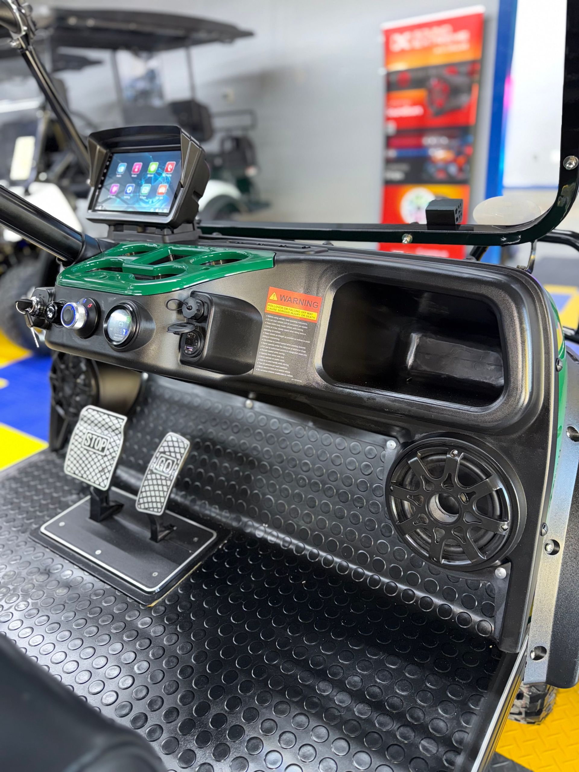 A close up of the dashboard of a golf cart