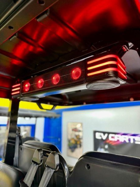 The inside of a vehicle with a sign that says ev parts