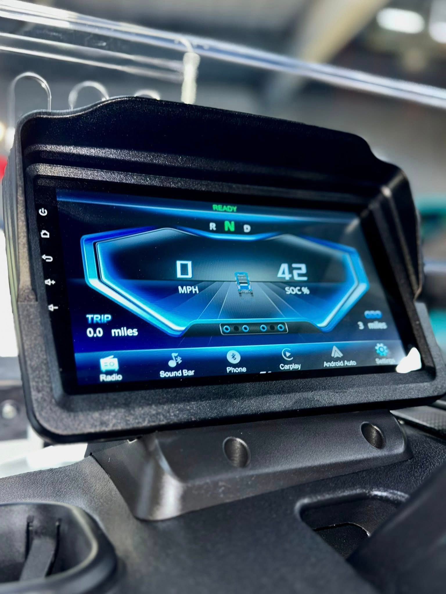 A close up of a dashboard with a gps on it.