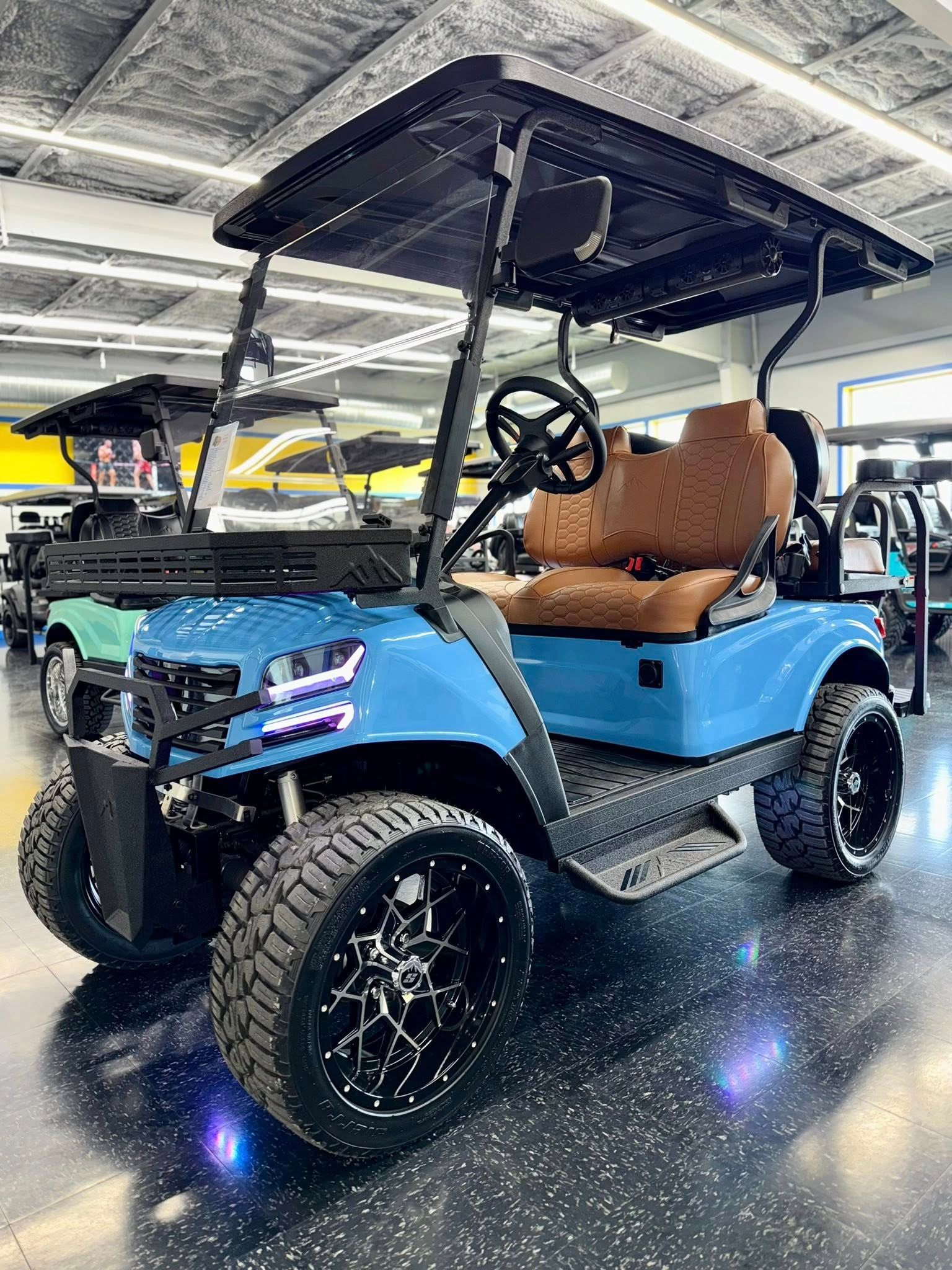 Blue golf cart with black rims, brown seat, and black roof.