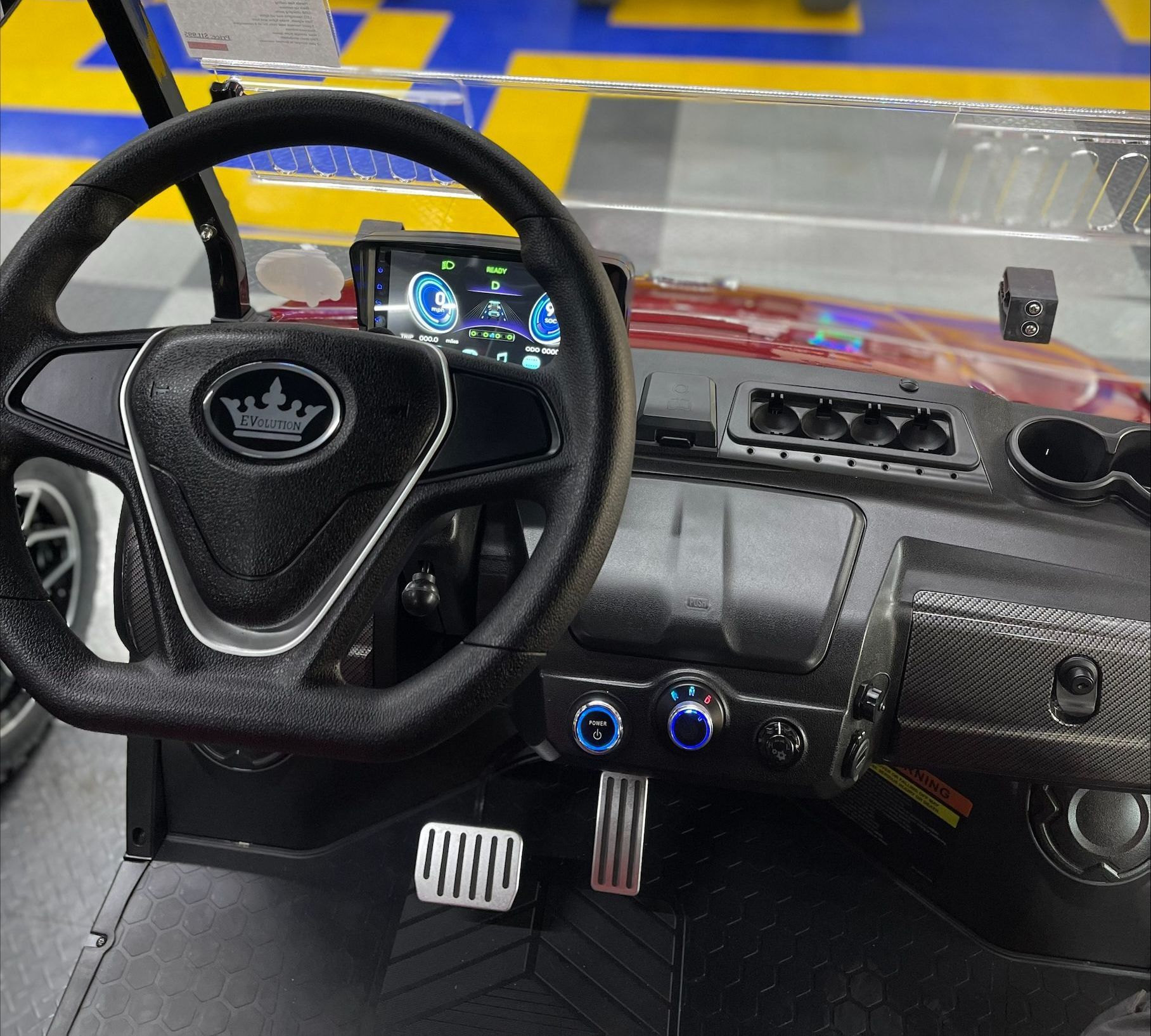 A steering wheel with a crown on it
