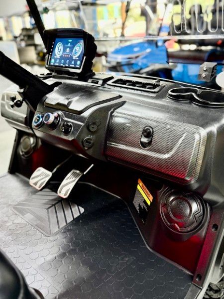 A close up of the dashboard of a golf cart.
