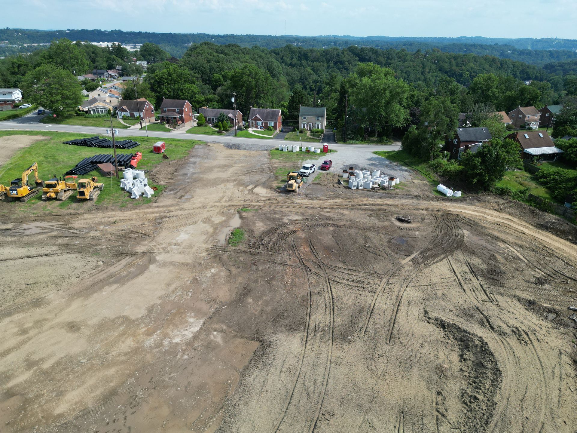 An aerial view of a construction site with a lot of dirt.