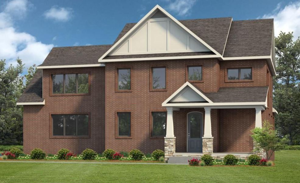 a large brick house with a porch and a lot of windows