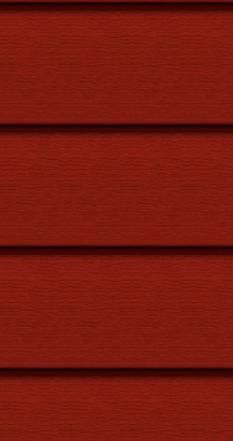 A close up of a red siding on a house.