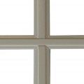 A close up of a window with a white frame on a white background.