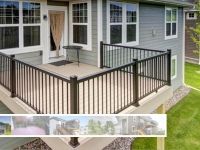 There is a balcony with a fence around it in front of a house.