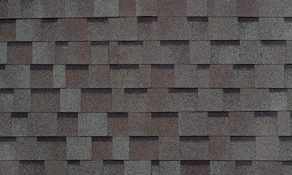 A close up of a roof with shingles on it.