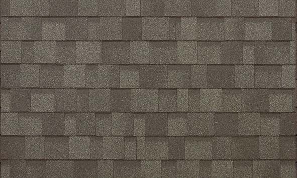 A close up of a roof with shingles on it.
