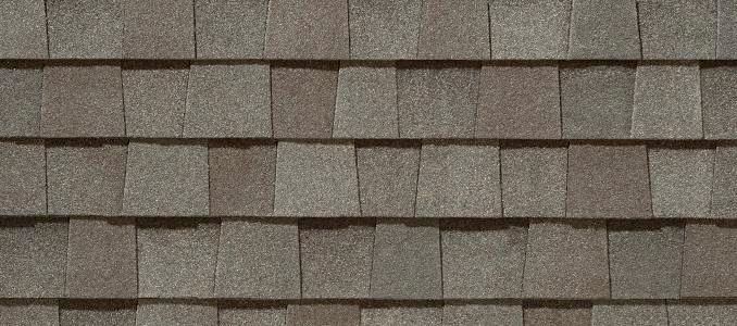 A close up of a roof with shingles on it.