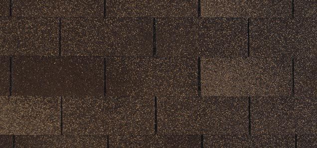 A close up of a brown roof shingle.