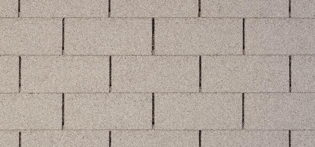 A close up of a white brick wall.