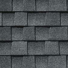 A close up of a roof with shingles on it.