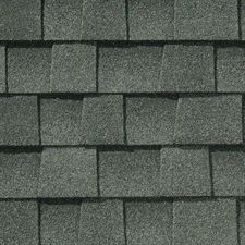 A close up of a roof with shingles on it.